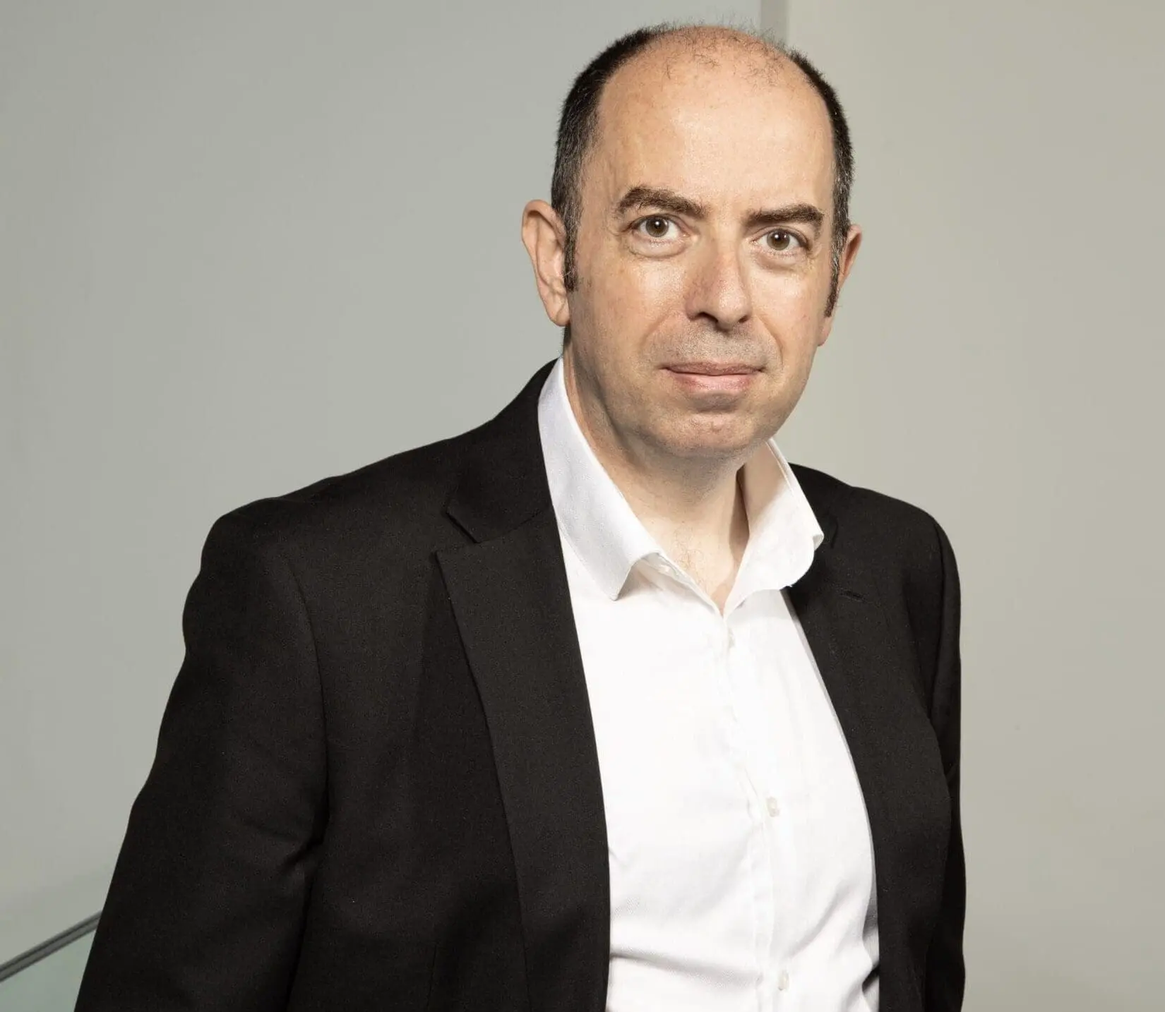 Dr. Derek John